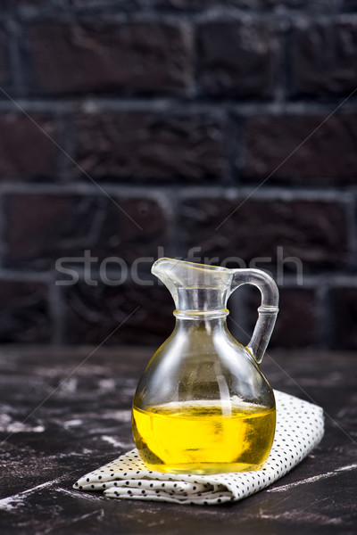 Aceite de girasol vidrio botella mesa flor alimentos Foto stock © tycoon