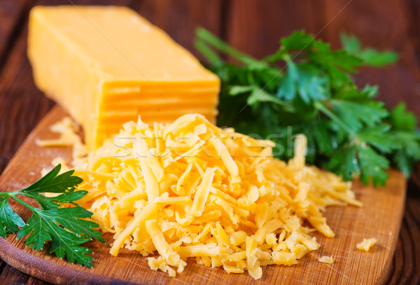 Cheddar fromages bord table orange grasse Photo stock © tycoon