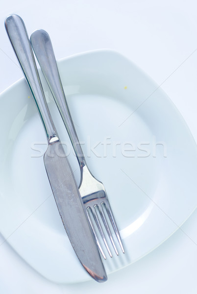 Konyhai felszerelés fém asztal vacsora kés villa Stock fotó © tycoon