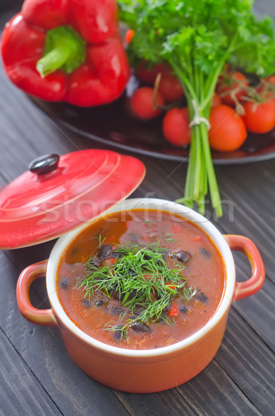Sopa de feijão madeira prato carne tomates quente Foto stock © tycoon