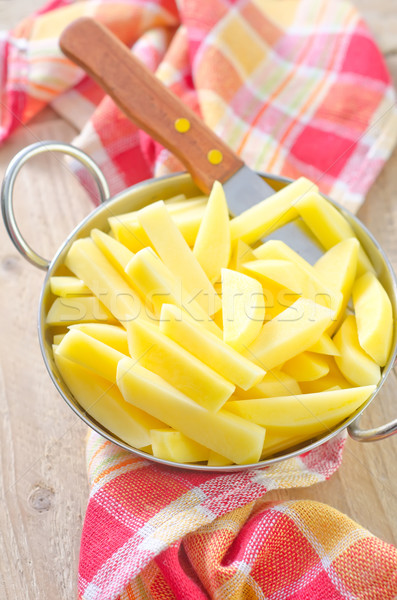 raw potato in metal bowl Stock photo © tycoon