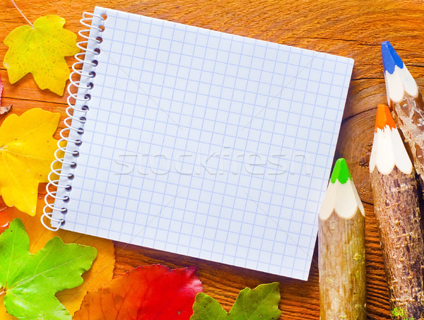 leaves and note on wooden background Stock photo © tycoon