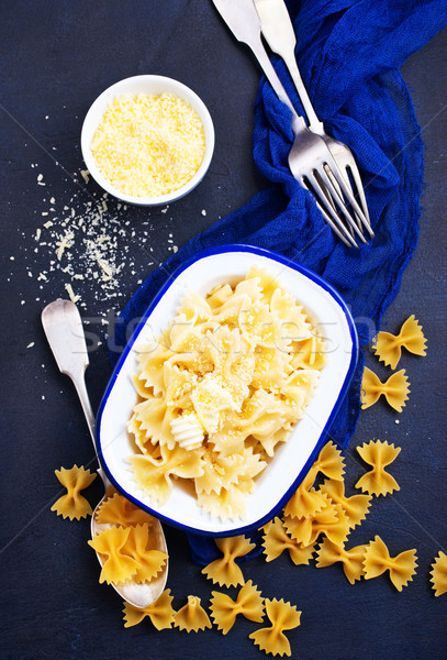 Stock photo: Pasta sprinkled with cheese 