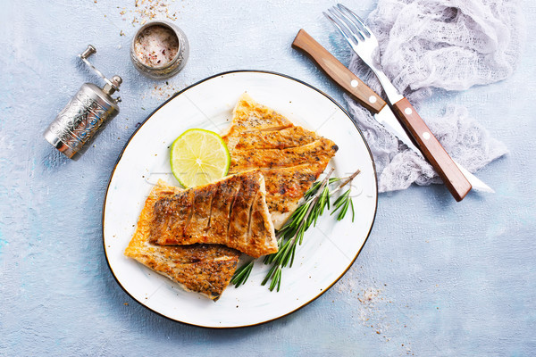 Stock photo: fried fish on plate