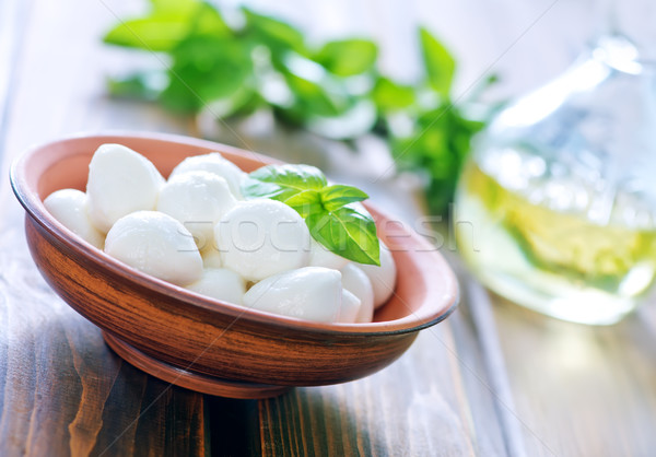 Mozzarella fromages bol table cuisine lait Photo stock © tycoon