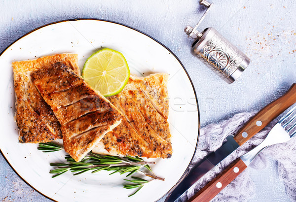 Stock photo: fried fish on plate