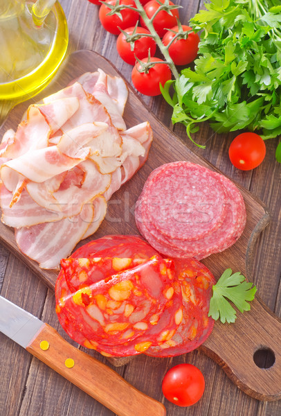 Stock photo: sausages,ham and salami on board
