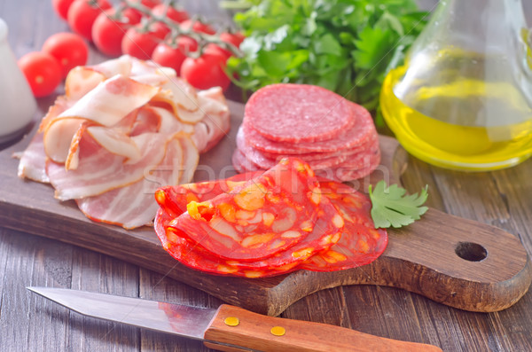 Stock photo: sausages,ham and salami on board