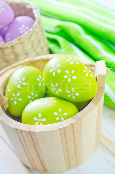 Ovos de páscoa páscoa pintar tabela verde grupo Foto stock © tycoon