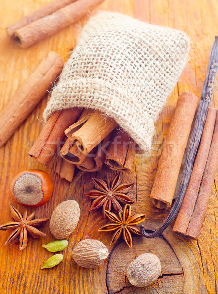 Aroma spice in the sack on the wooden board Stock photo © tycoon