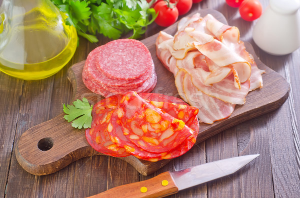 sausages,ham and salami on board Stock photo © tycoon