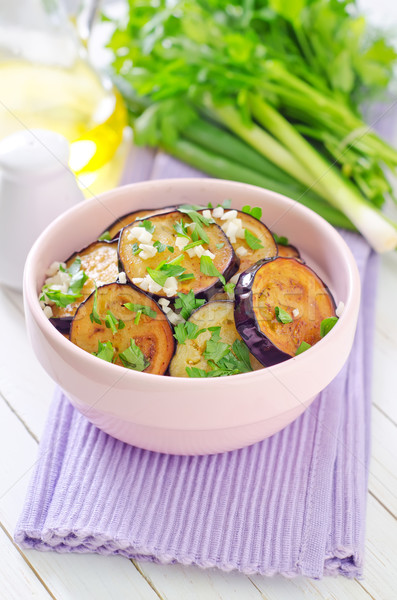 Foto stock: Frito · berinjela · comida · madeira · luz · vidro