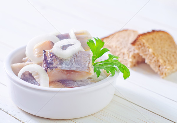 herring with onion and bread Stock photo © tycoon