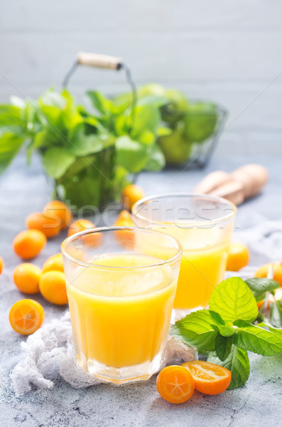 Jus verre table bois design orange [[stock_photo]] © tycoon