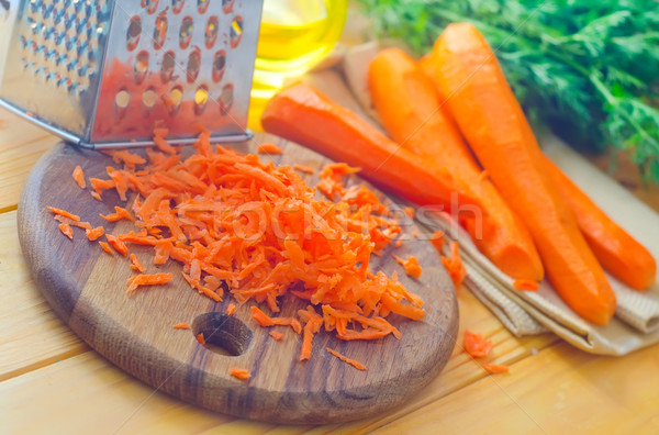raw carrots and knife on the wooden board Stock photo © tycoon