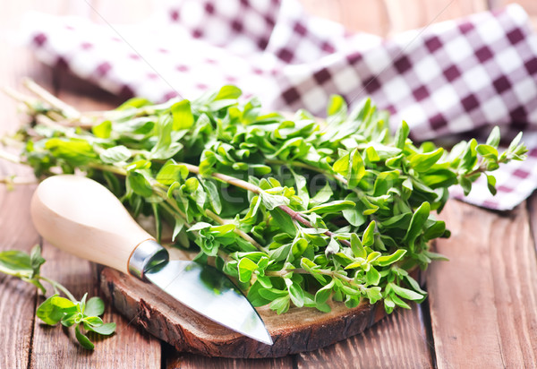 marjoram on a wooden rustic table Stock photo © tycoon