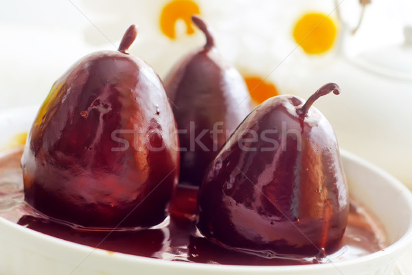 Păr ciocolată alimente dulce fruct fundal tabel Imagine de stoc © tycoon