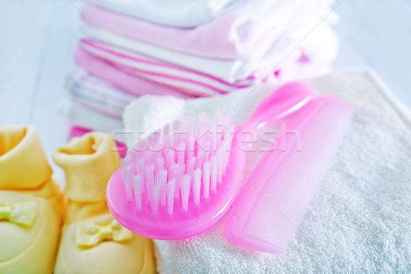 hairs brushes and baby clothes Stock photo © tycoon