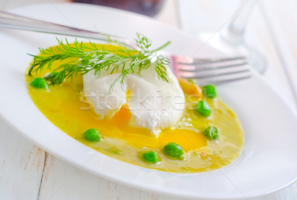 Fresh soup from green peas and egg-poached Stock photo © tycoon