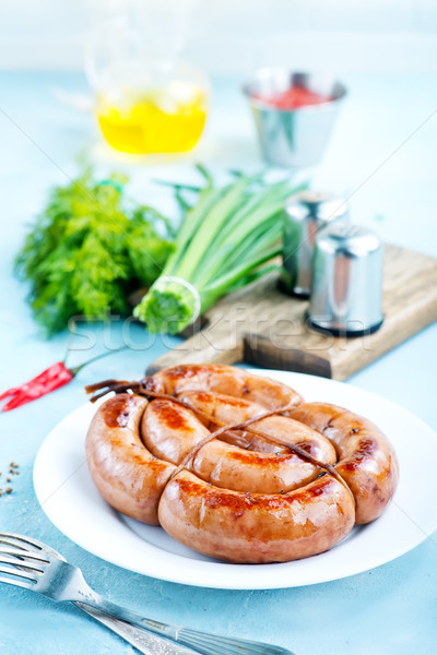 Salsichas branco prato tabela comida cão Foto stock © tycoon