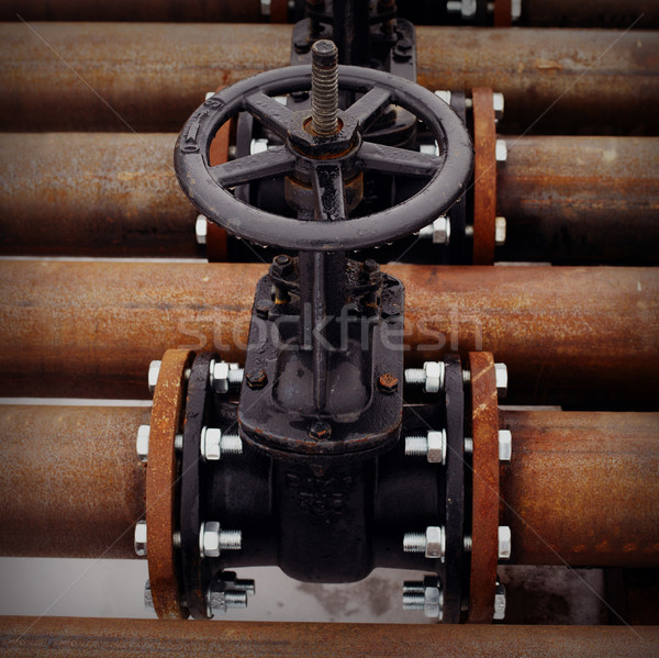Oil and gas pipeline valves on a piping Stock photo © ultrapro