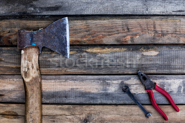 Old ax and other tools lying on the boards Stock photo © ultrapro
