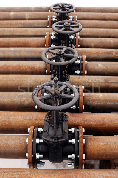 Oil and gas pipeline valves on a piping Stock photo © ultrapro