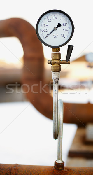 Stock photo: manometer on the rusty pipe