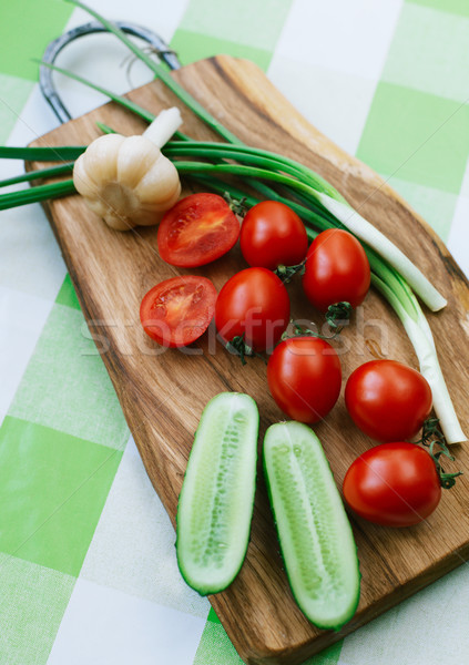tomatoes and green onions on cutting board Stock photo © ultrapro