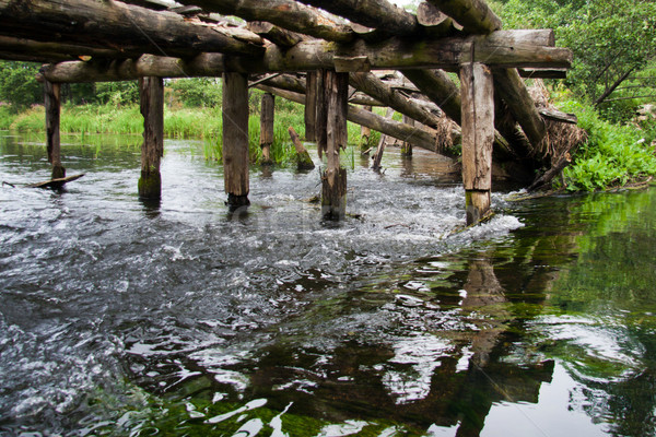 Elpusztított fából készült híd gyors mozog folyó Stock fotó © ultrapro