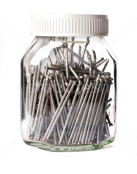 steel nails neatly stacked in a glass jar Stock photo © ultrapro