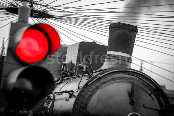 old train with red traffic light - black and white image Stock photo © umbertoleporini