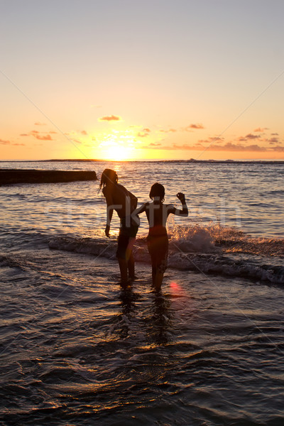 Sunset swim Stock photo © Undy