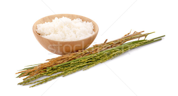 white rice (Thai Jasmine rice) in wooden bowl and unmilled rice  Stock photo © ungpaoman