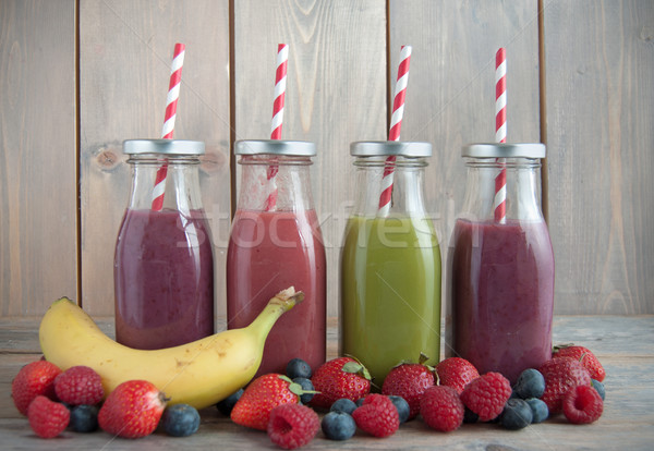 Flavoured smoothies in bottles  Stock photo © unikpix
