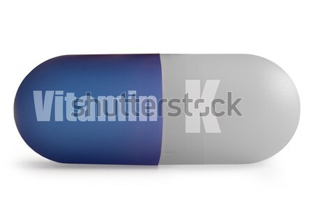 Vitamina píldora blanco signo macro Foto stock © unikpix