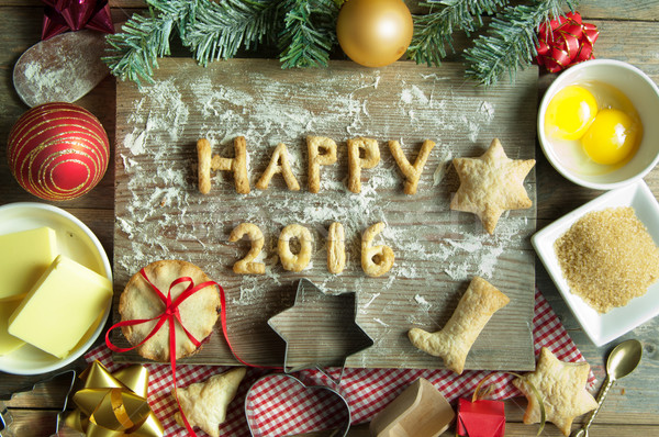 Happy new year 2016 heureux cookies haut planche à découper Photo stock © unikpix