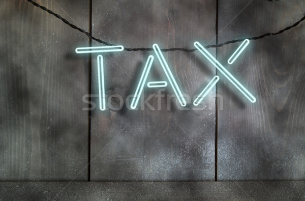 Tax fluorescent neon sign Stock photo © unikpix