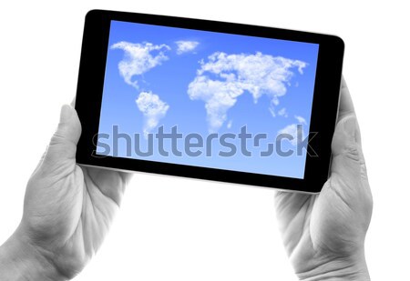 Tablet nube mappa del mondo mani computer Foto d'archivio © unikpix