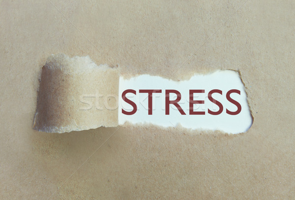 Torn paper uncovering stress Stock photo © unikpix