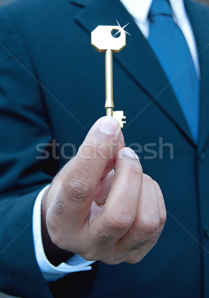 Biznesmen kluczowych błyszczący złota człowiek Zdjęcia stock © unikpix