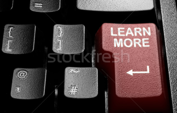 Apprendre plus ordinateur clé flèche Photo stock © unikpix