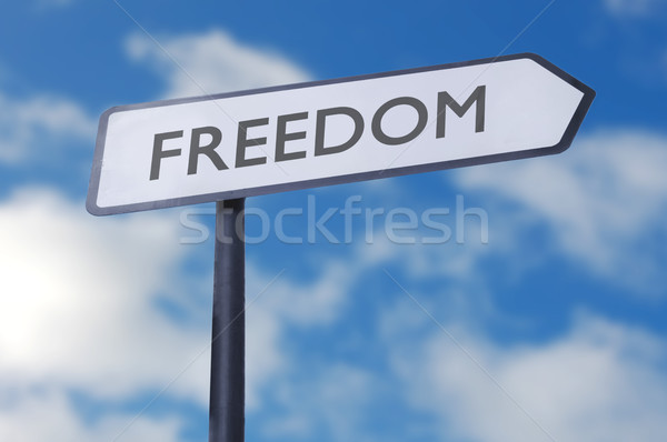 Wolności podpisania ulicy wskazując niebo chmury lata Zdjęcia stock © unikpix