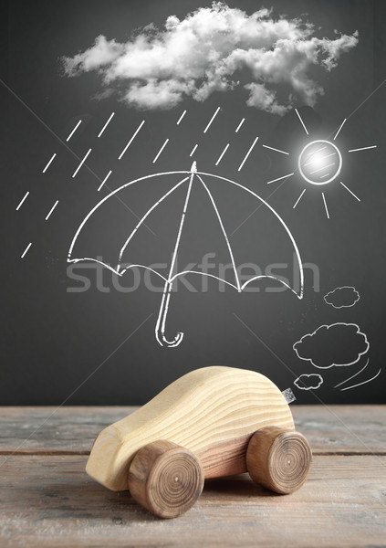 [[stock_photo]]: Voiture · assurance · parapluie · jouet · nuages · pluie
