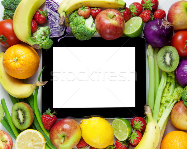 Fruct legume fructe in jurul calculator comprimat Imagine de stoc © unikpix