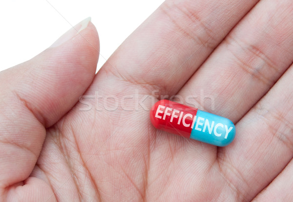 Hatásfok kéz tart tabletta fehér siker Stock fotó © unikpix