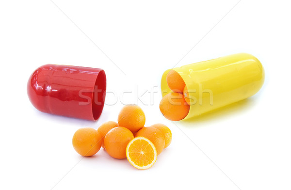Witamina c miniatura pomarańcze wewnątrz kapsułka Zdjęcia stock © unikpix