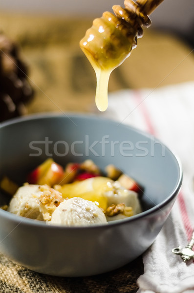 Apple Sauce Dripping From Dipper In Bowl Stock photo © unkreatives