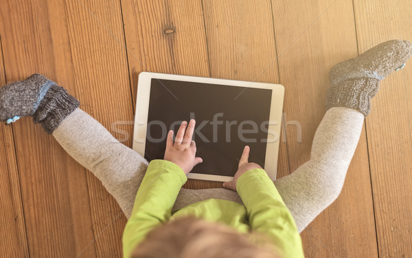 Stock photo: Toddler touching tablet