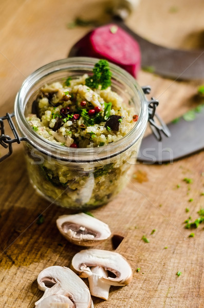 Stock photo: Salad In Jar And Mushrooms On Chopping Board
